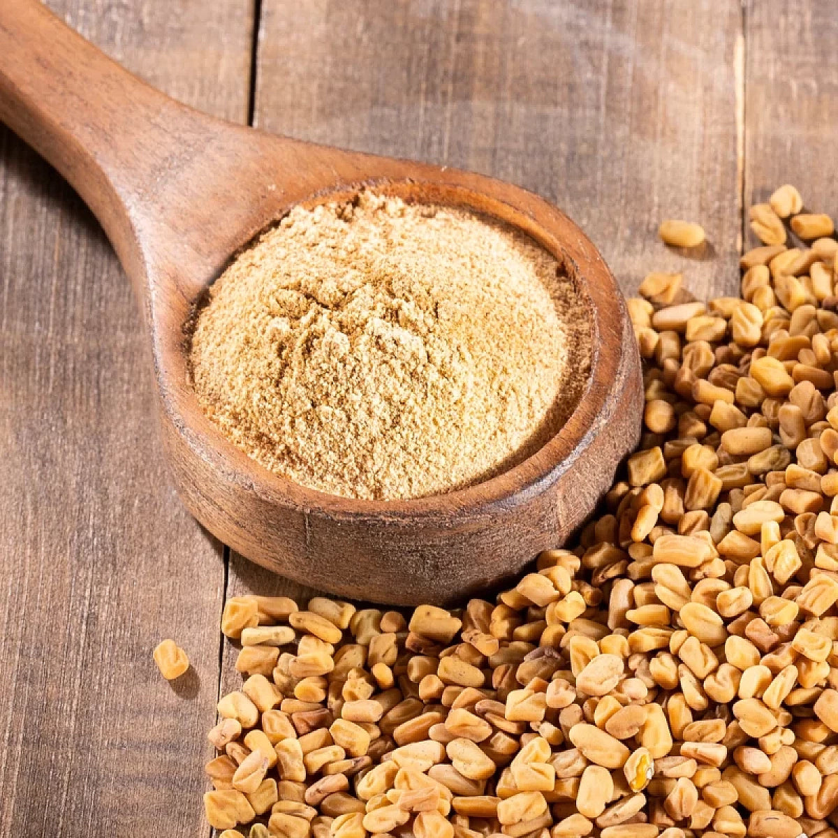 Acure Fenugreek Powder on Wooden Spoon - Detailed Texture View | মেথি গুঁড়ার ক্লোজ-আপ