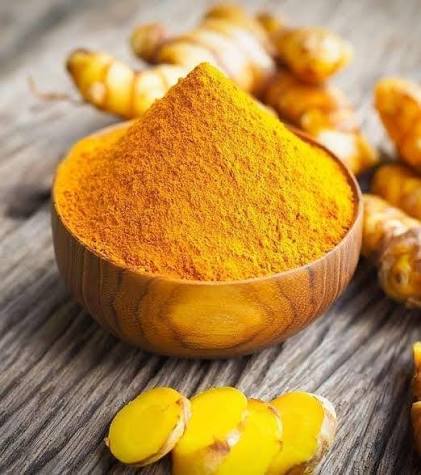 Acure Pure Wild Turmeric Powder Heap in Wooden Bowl with Slices - Kasturi Haldi | বাটিতে কস্তুরি হলুদ গুঁড়া